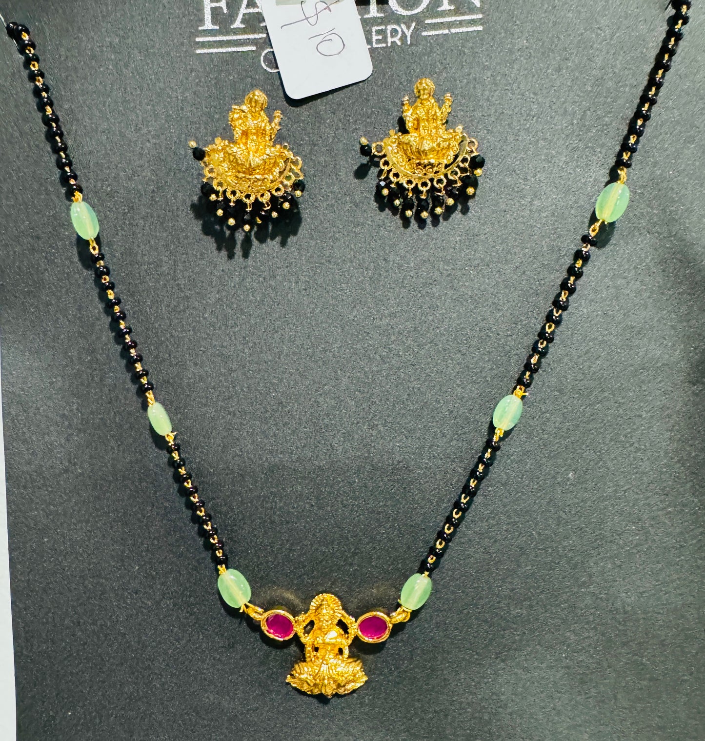 Black Beads WIth Laxmi Devi Pendent And earrings