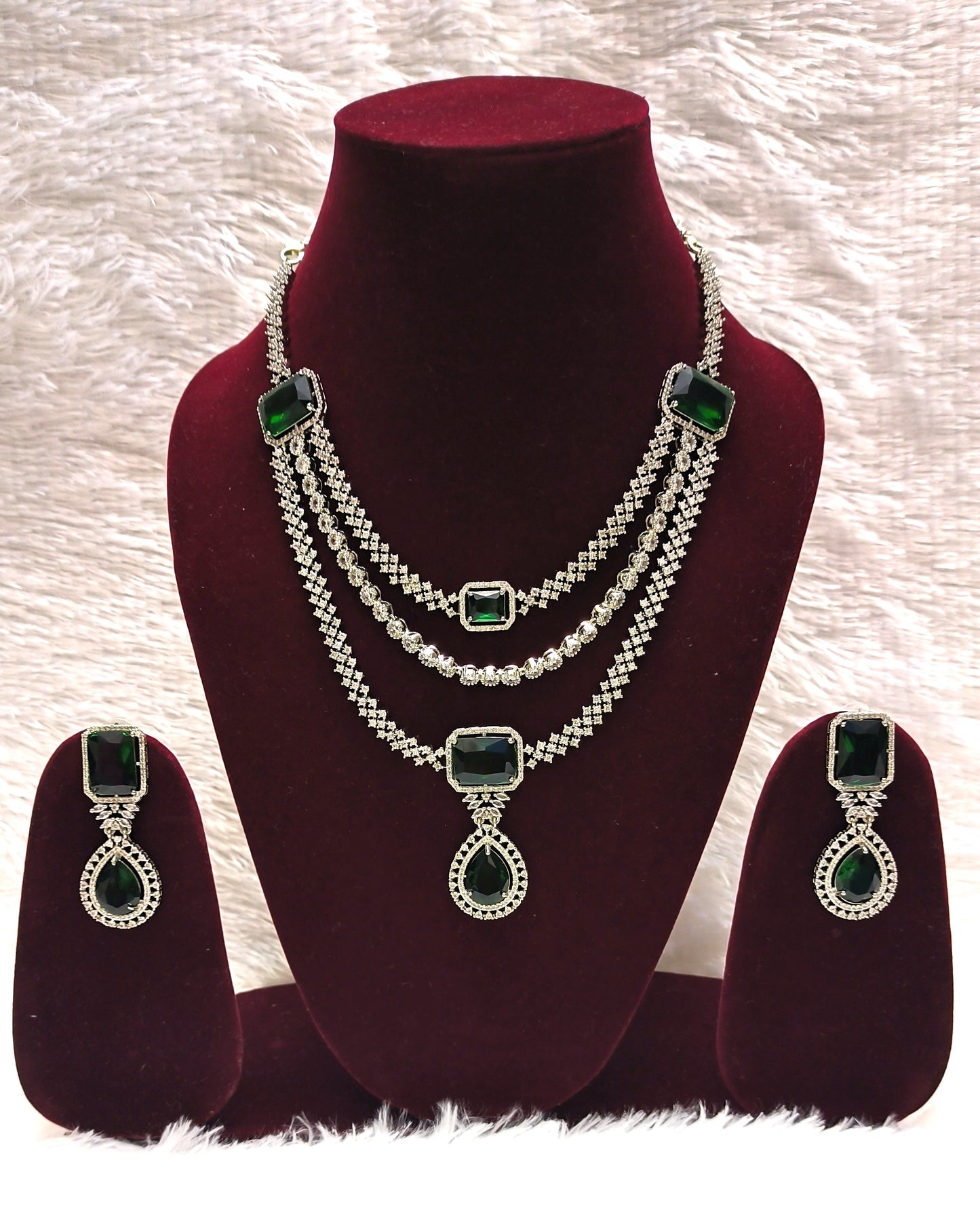 Attractive Multi Layered Necklace Set with AD's and Emeralds