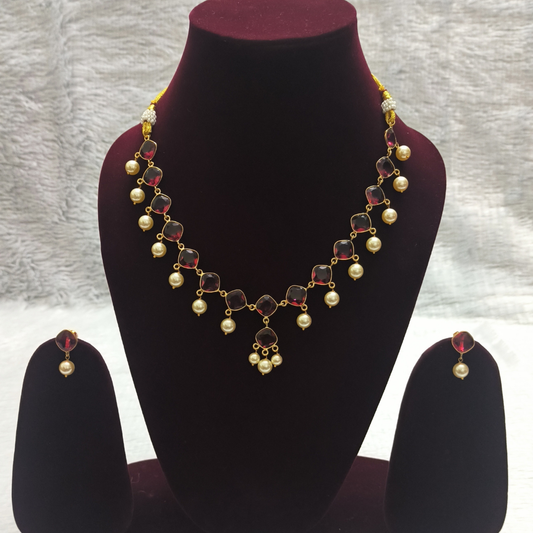 Glamorous Maroon Kundan Necklace with Pearl Drops