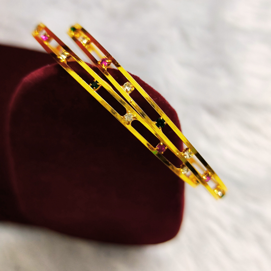 Bangles with Green stones.